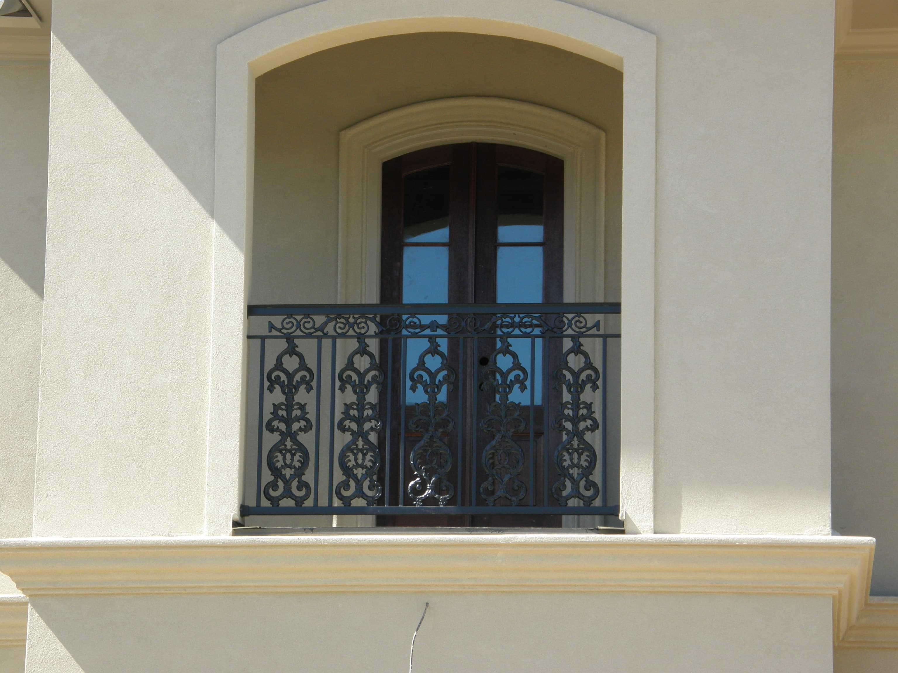 Decorative iron handrail on a balcony